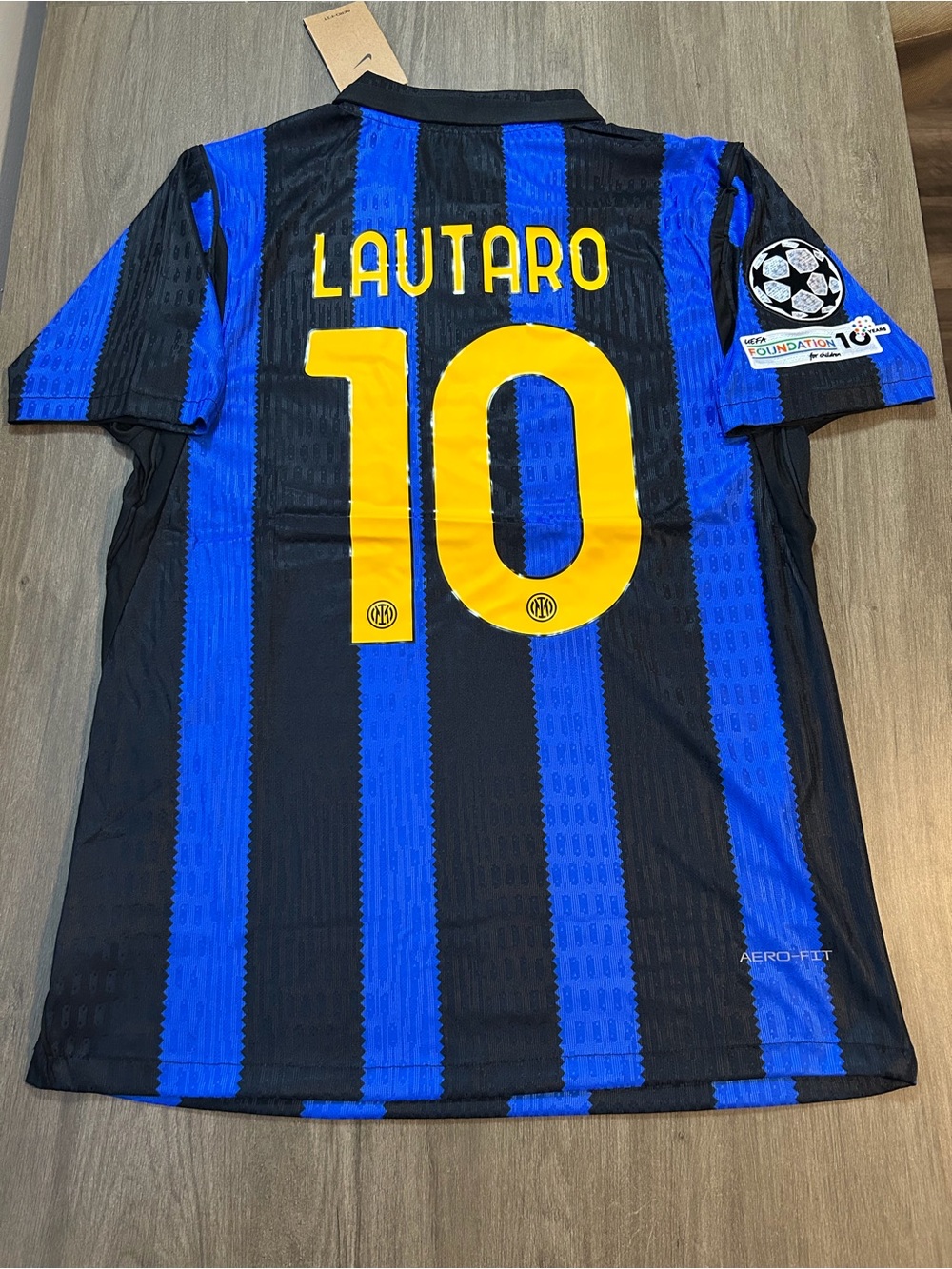 Milano Blue & Black Striped Soccer Jersey with Yellow Accents
